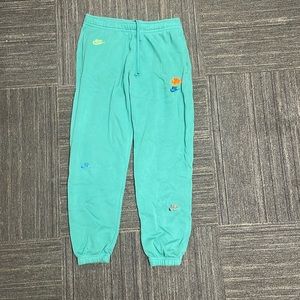 Mens green Nike club fleece brushed joggers